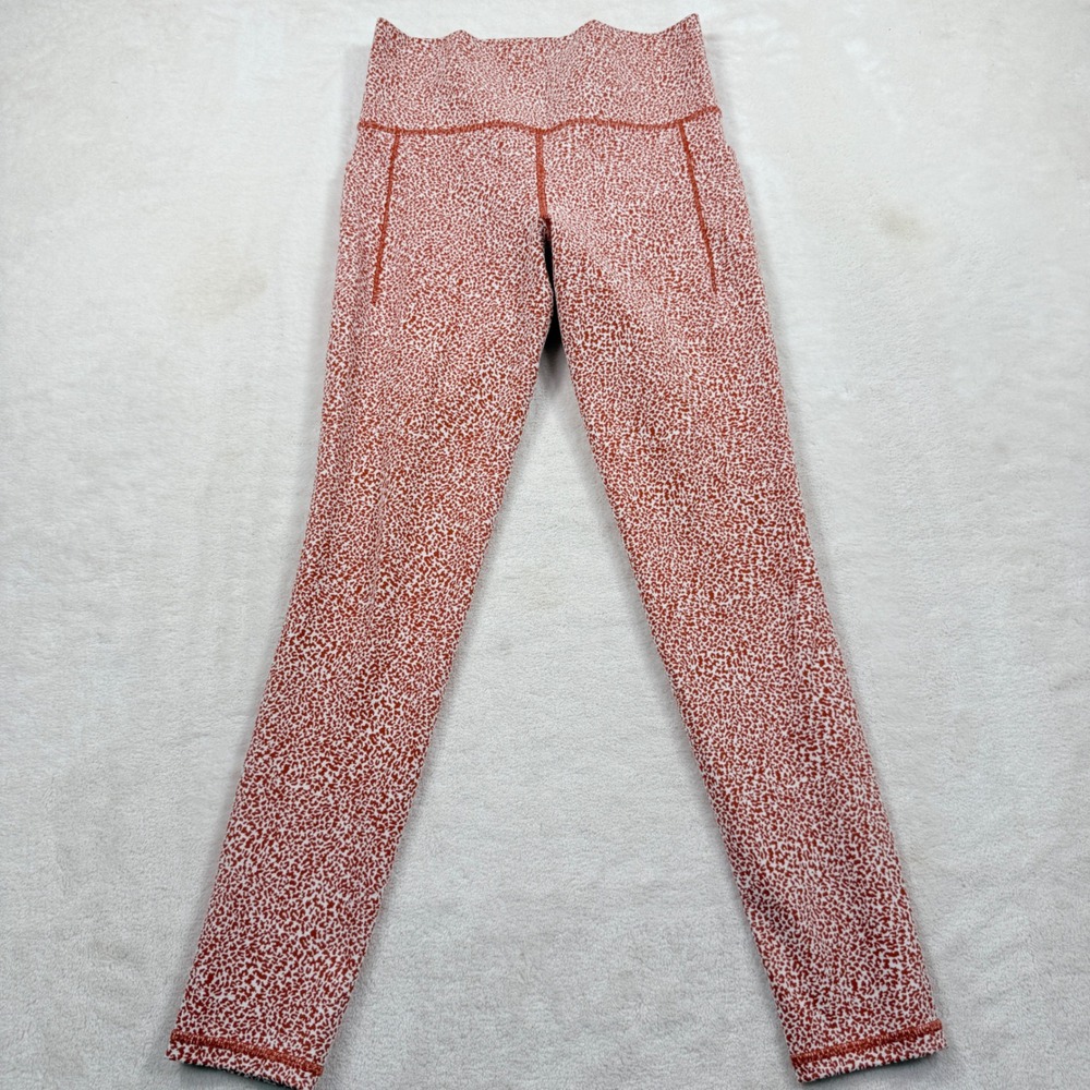 Athleta Salutation Stash II Textured Tight Orange White Print Leggings Size ST